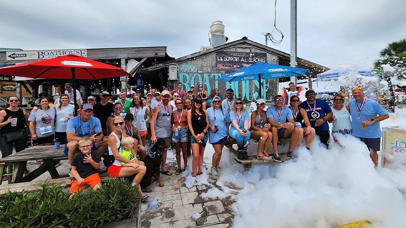 Crowd inside Boathouse Oyster Bar during a live music night in Destin Florida