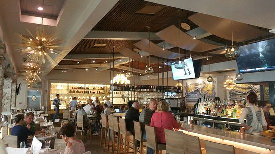 Craft cocktails and seafood bites at Emeril’s Coastal happy hour in Destin Florida