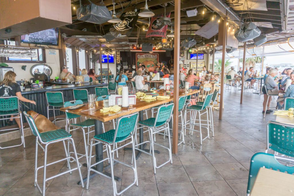 Happy hour cocktails with a harbor view at Harry T’s Lighthouse in Destin Florida