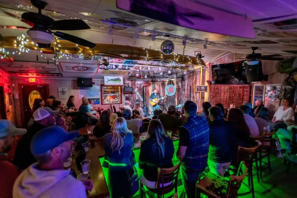Crowd enjoying live music at Stinky’s Bait Shack in Santa Rosa Beach